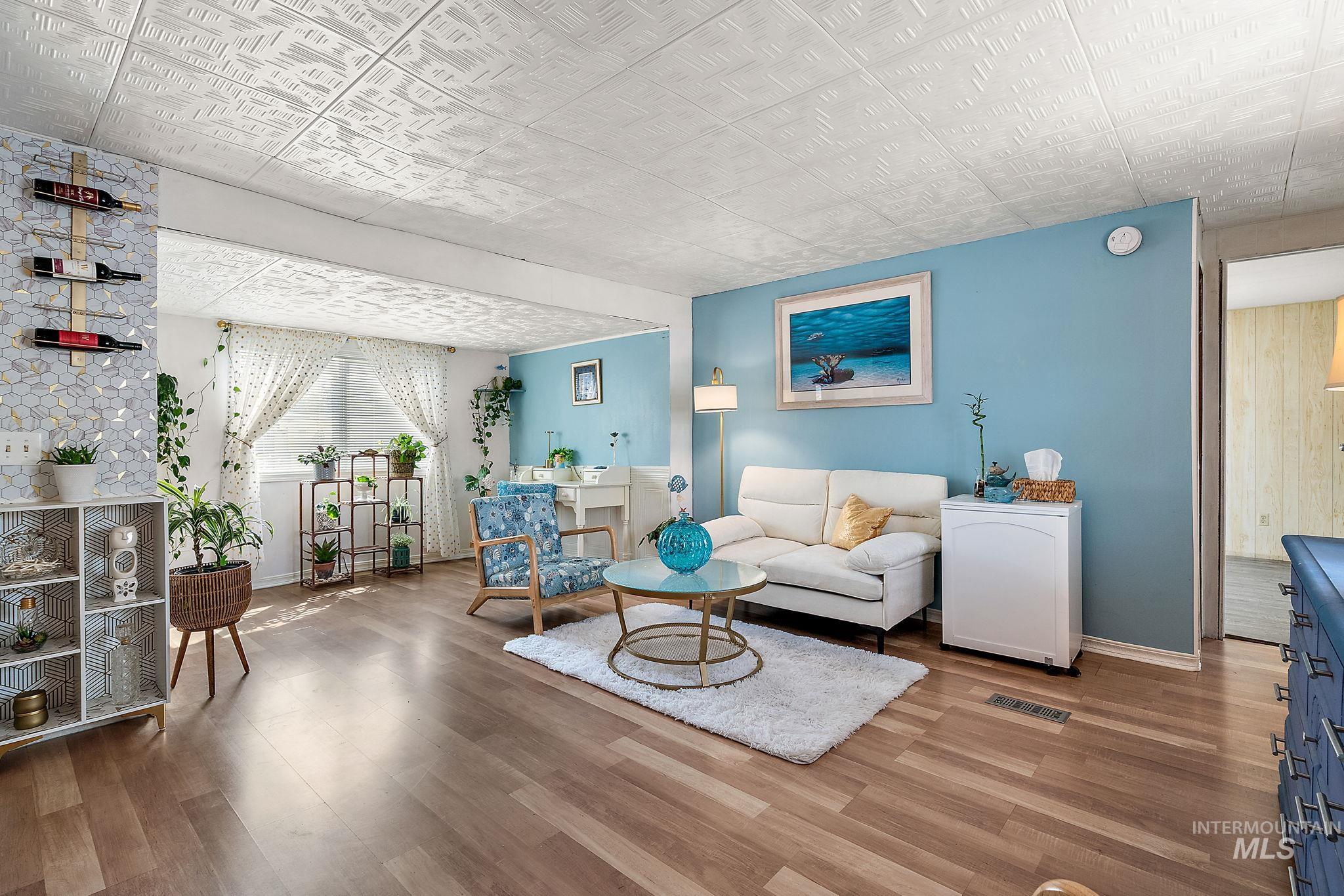 Living area with wood finished floors