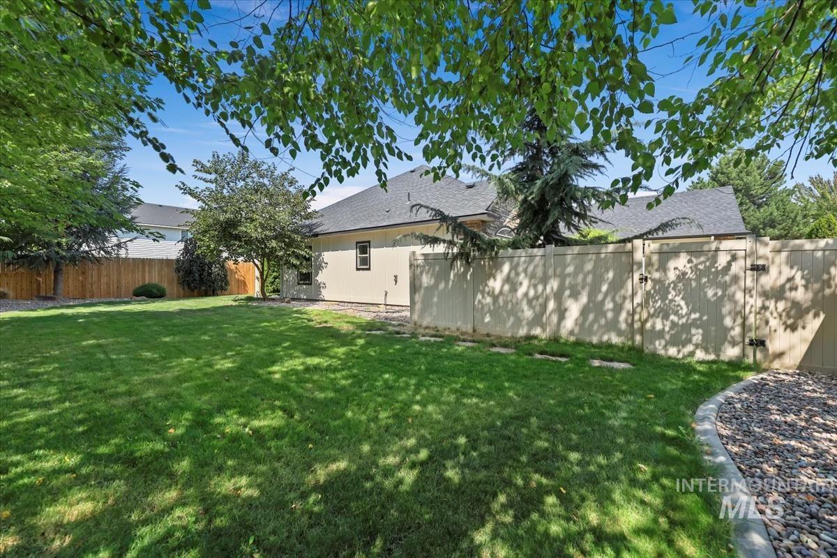 View of fenced backyard