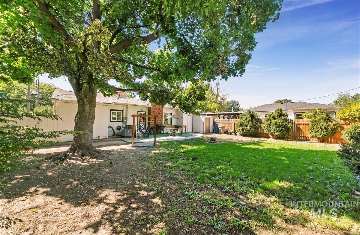 View of yard with a patio