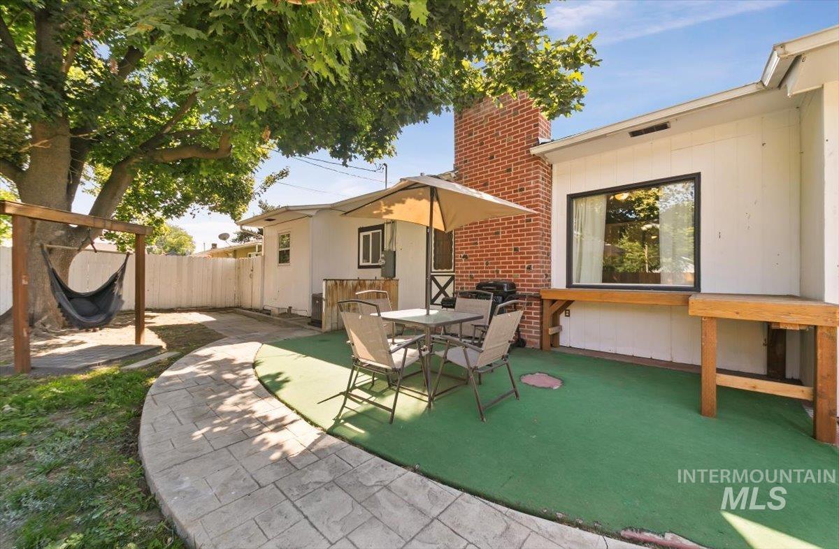 View of patio featuring outdoor dining area