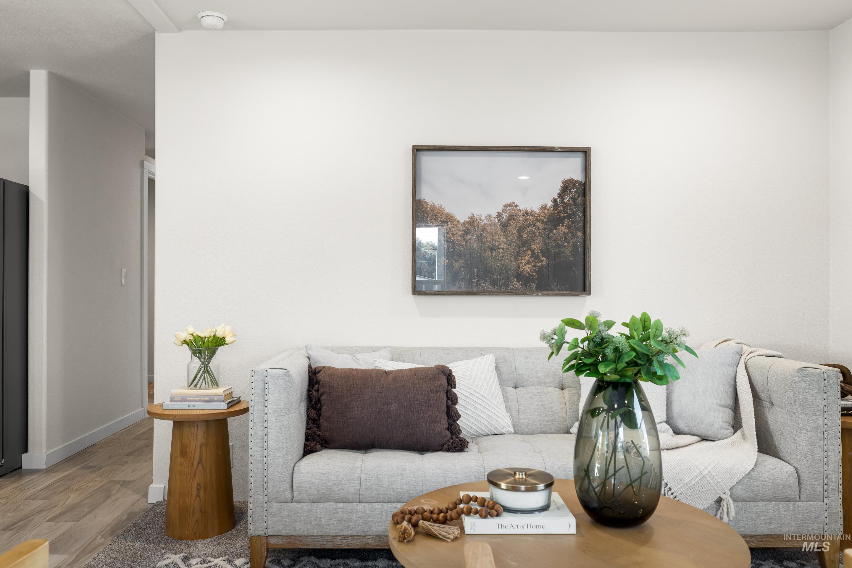 Living area featuring wood finished floors and baseboards