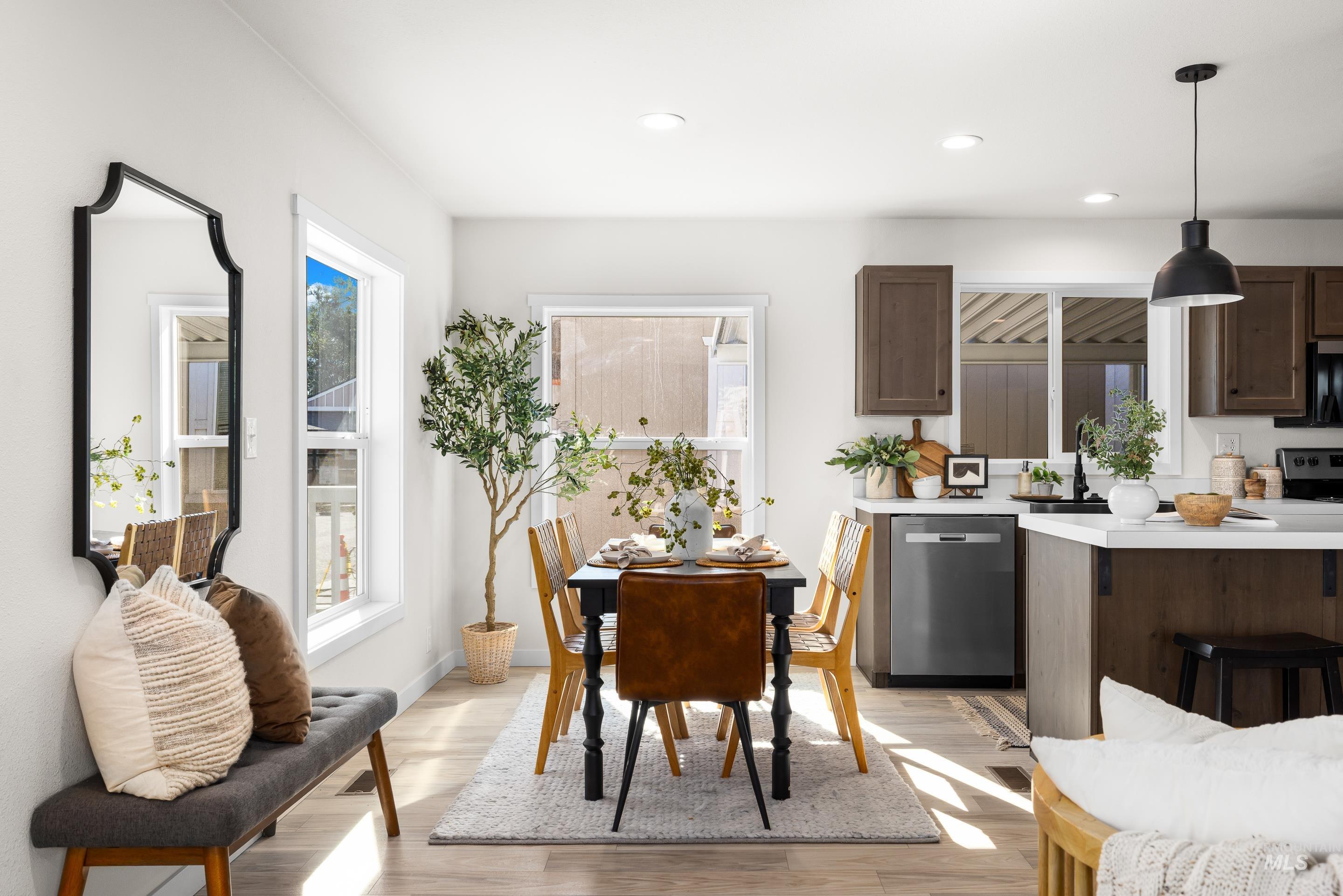 Dining area featuring recessed lighting and light wood-type flooring