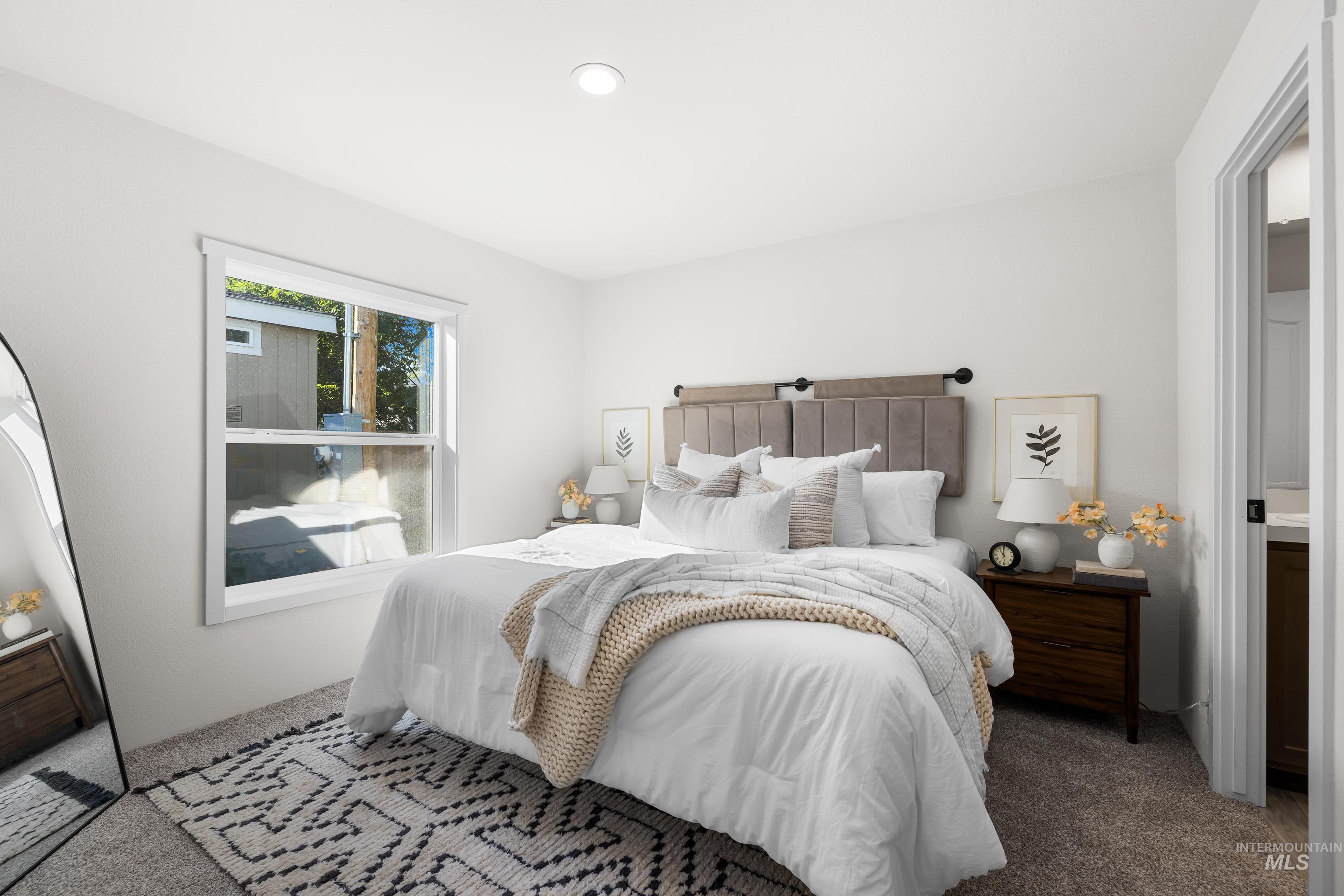 Bedroom featuring carpet flooring and recessed lighting