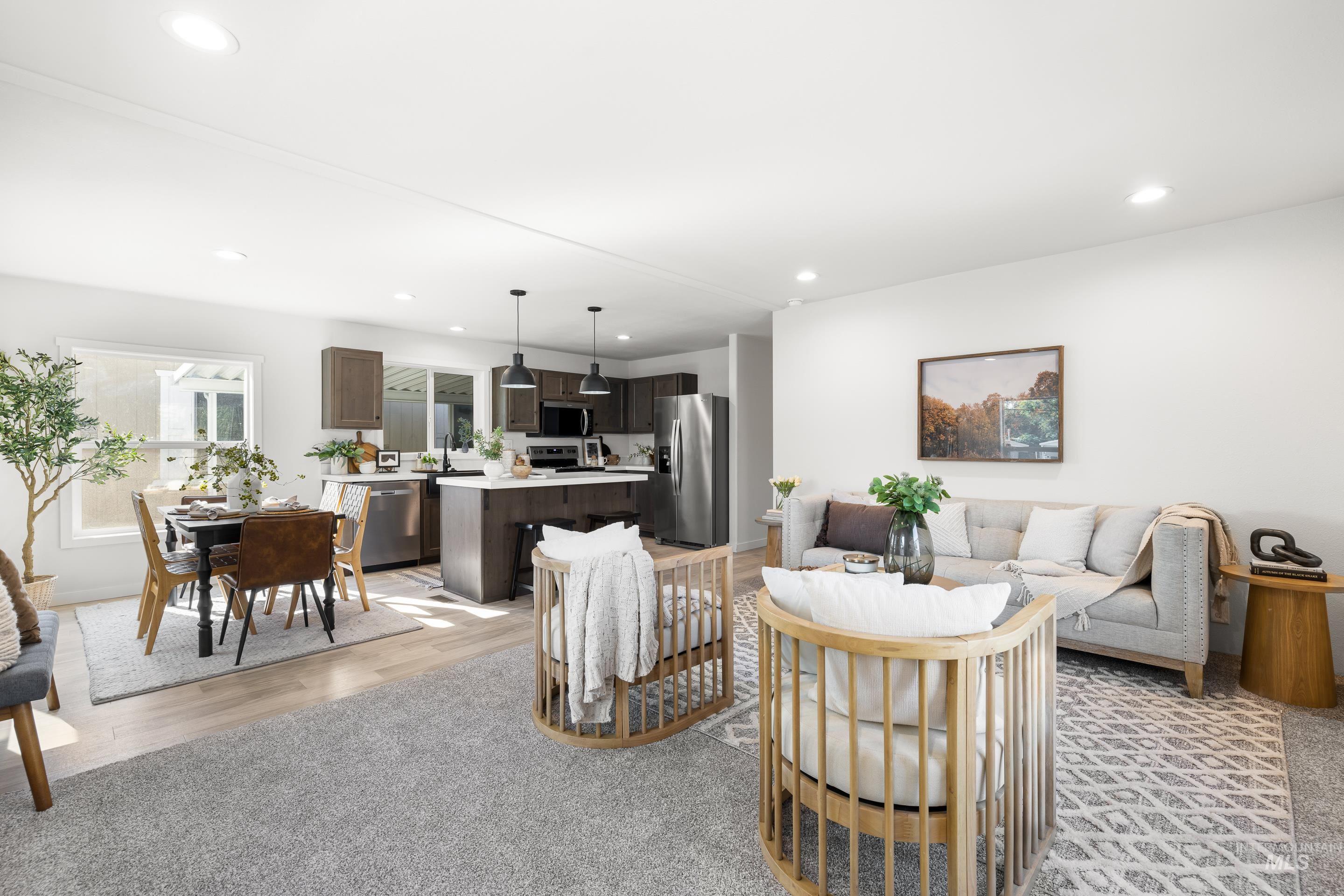 Living area featuring recessed lighting and light wood-type flooring