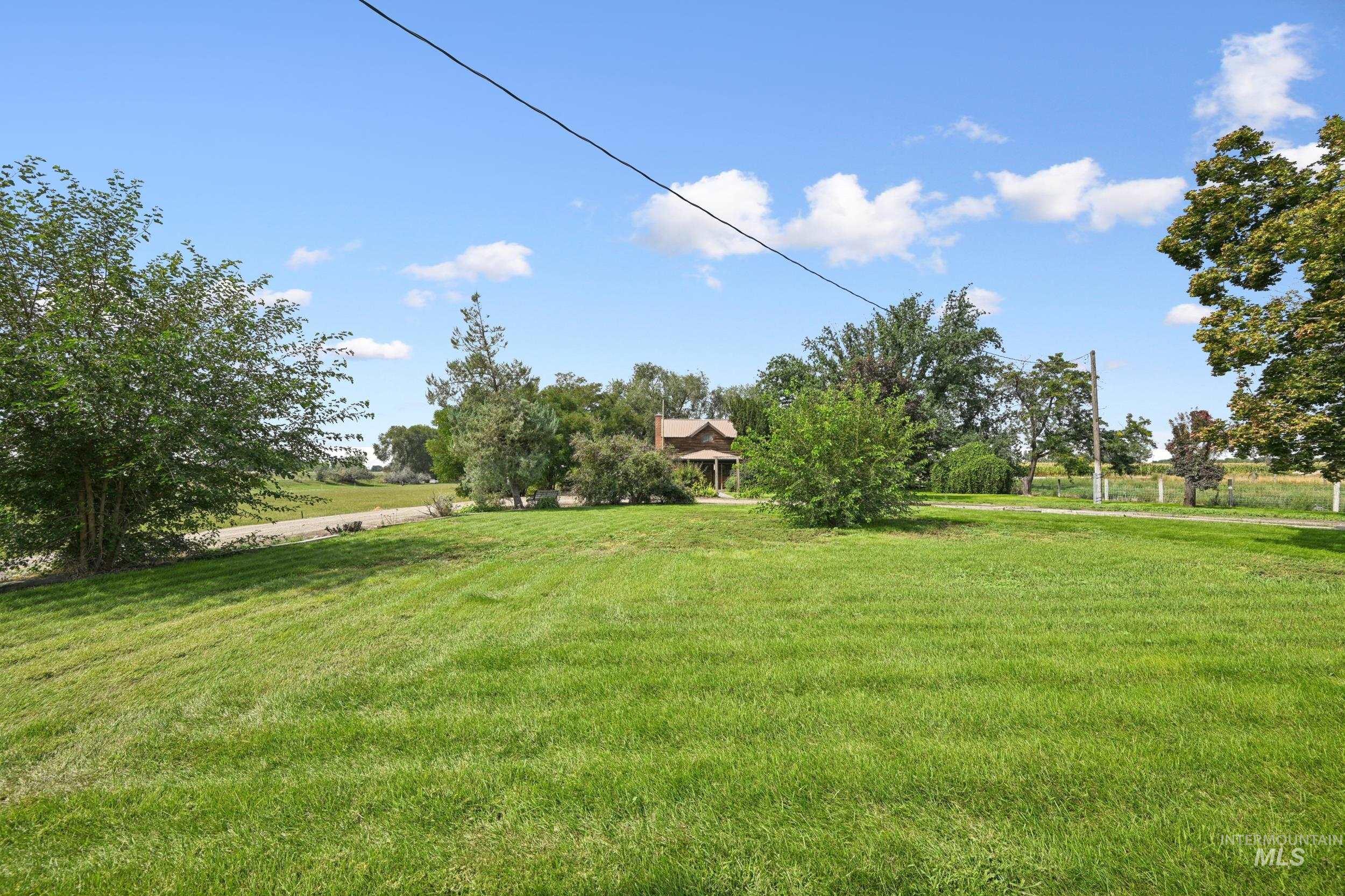 View of grassy yard featuring a view of countryside