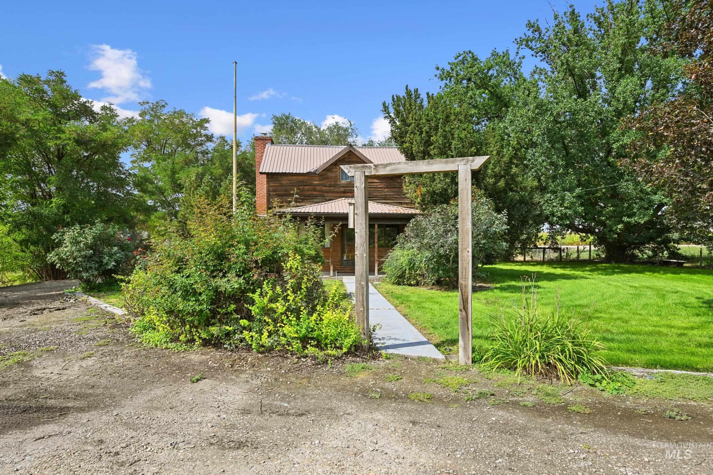 View of property's community with a yard