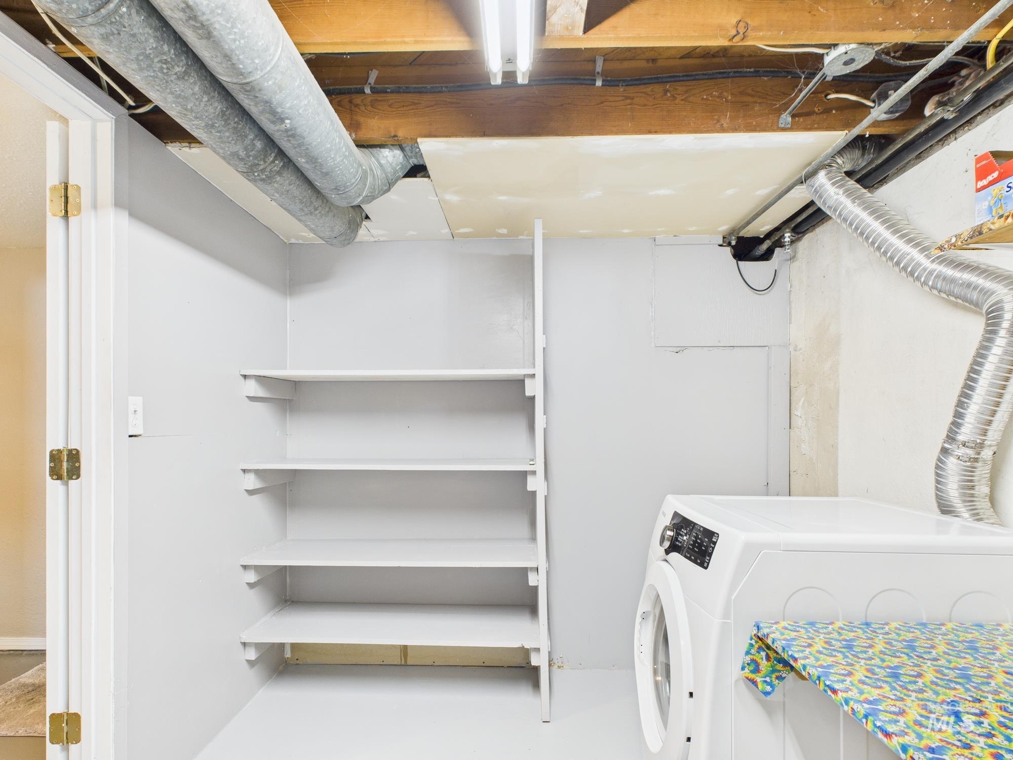 Laundry area with washer / dryer