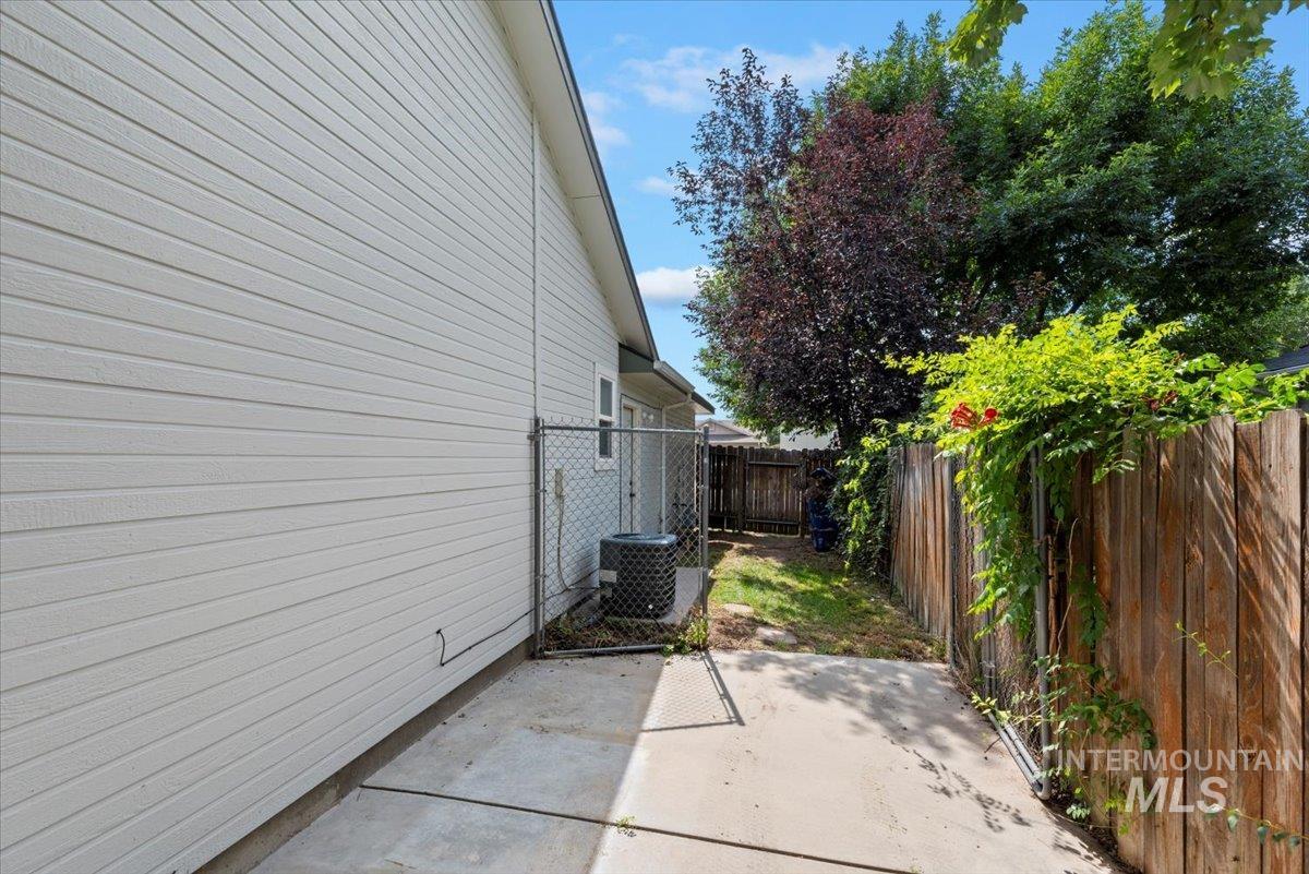View of home's exterior featuring a patio area and a fenced backyard