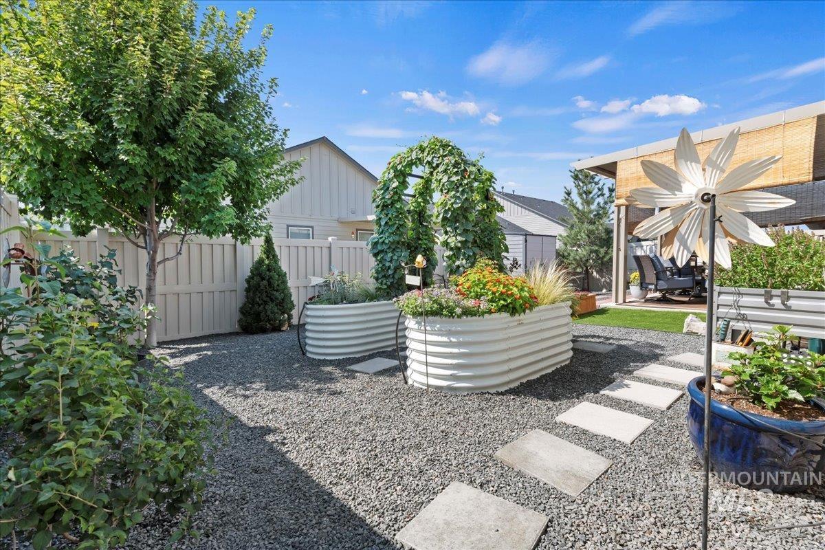 View of fenced backyard