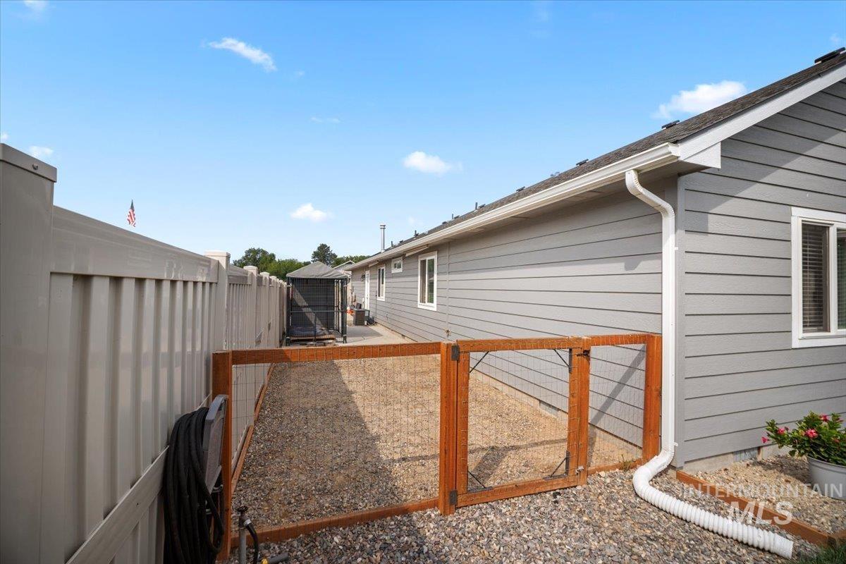 View of home's exterior featuring a fenced backyard