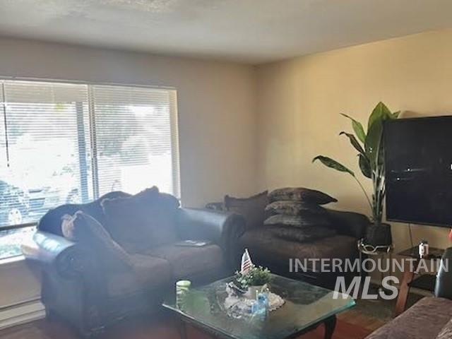Living room with dark wood finished floors