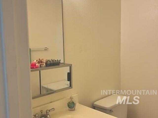 Bathroom featuring toilet and vanity