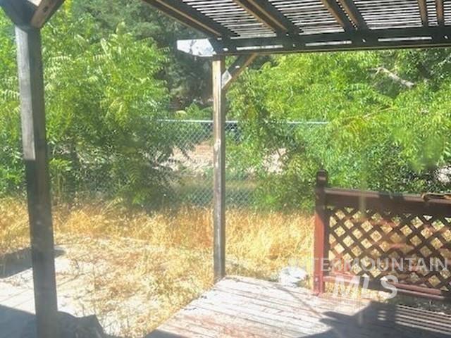 View of yard featuring a pergola