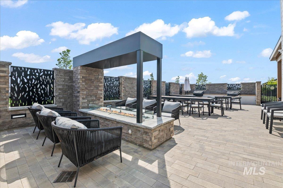 View of patio featuring outdoor dining area