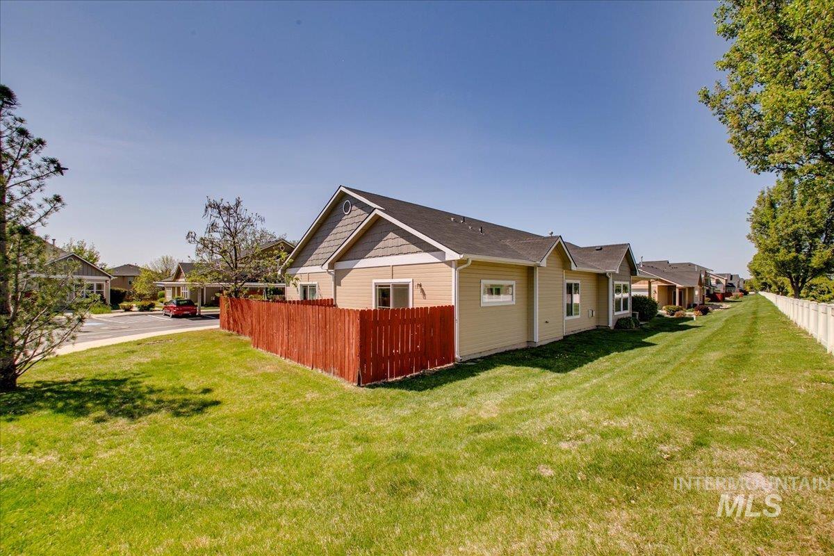 View of property exterior featuring a residential view