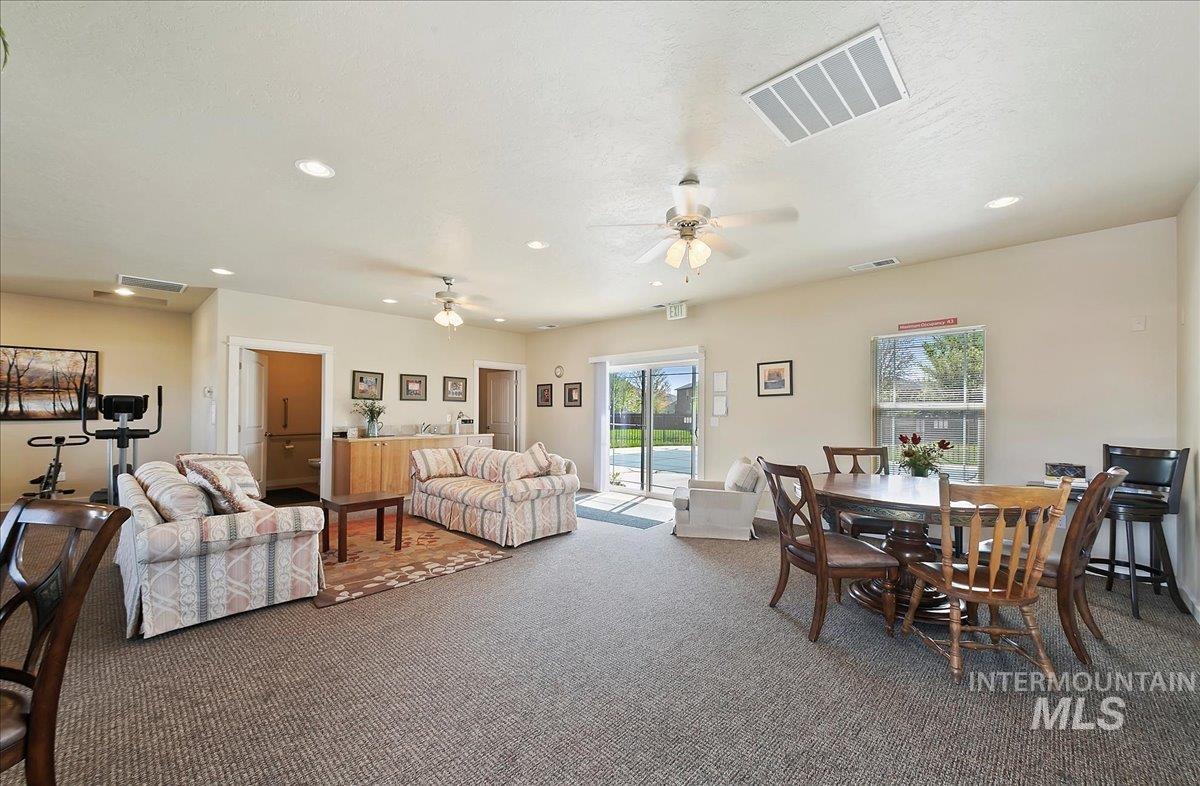 Fantastic Place to Socialize, has Two Changing Bathrooms, Workout Equipment & Slider Door to the Pool!