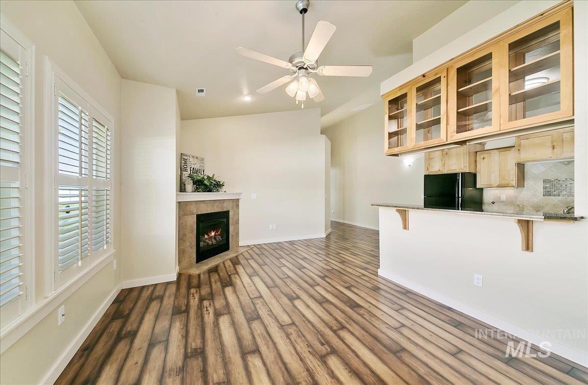 More than enough room for a comfortable sofa and a chair to sit and watch the gas log fireplace!
