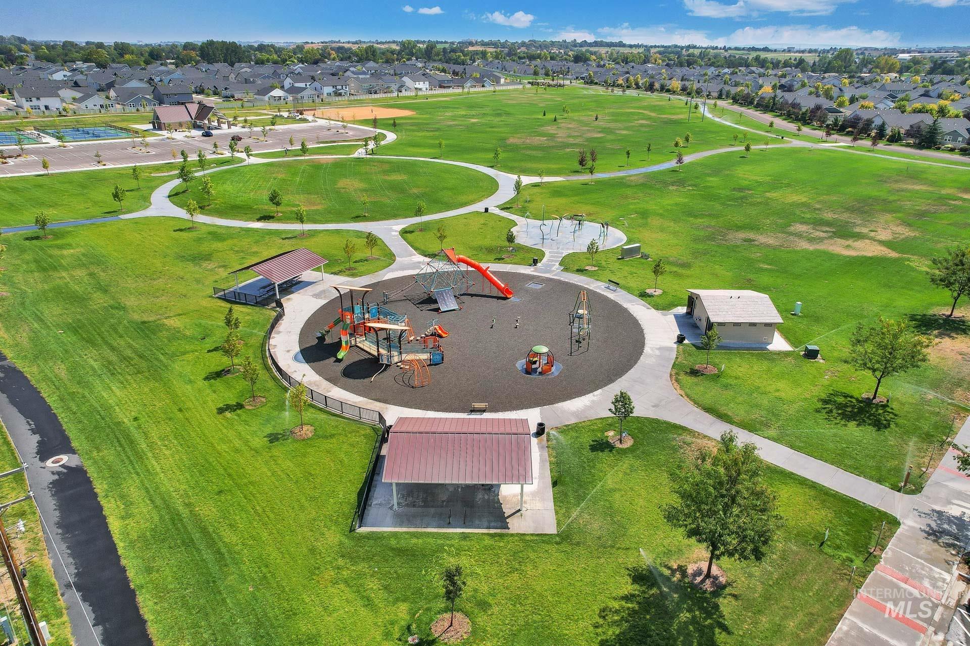 Aerial view of residential area featuring a park