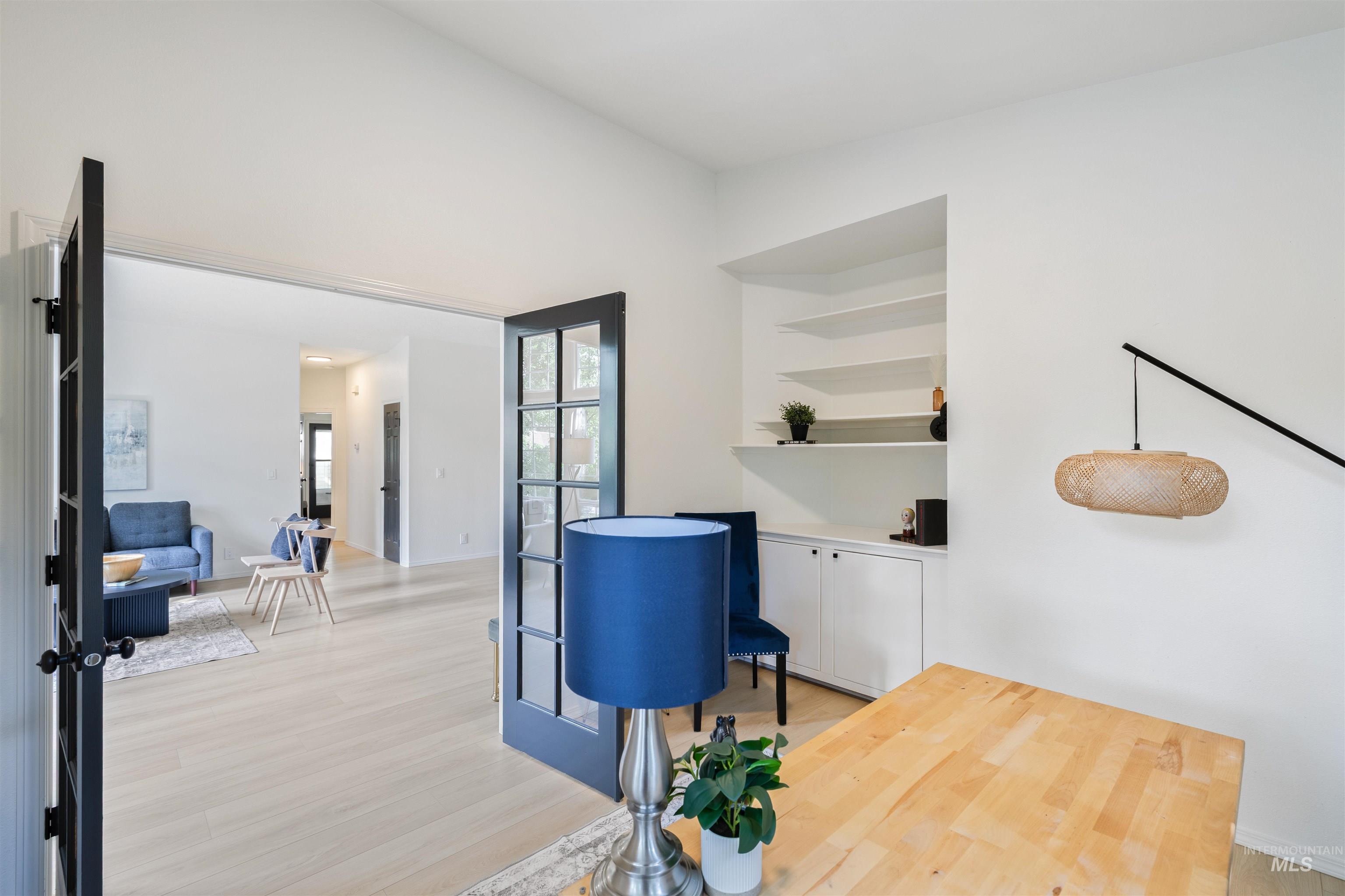 Office space featuring light wood-style flooring
