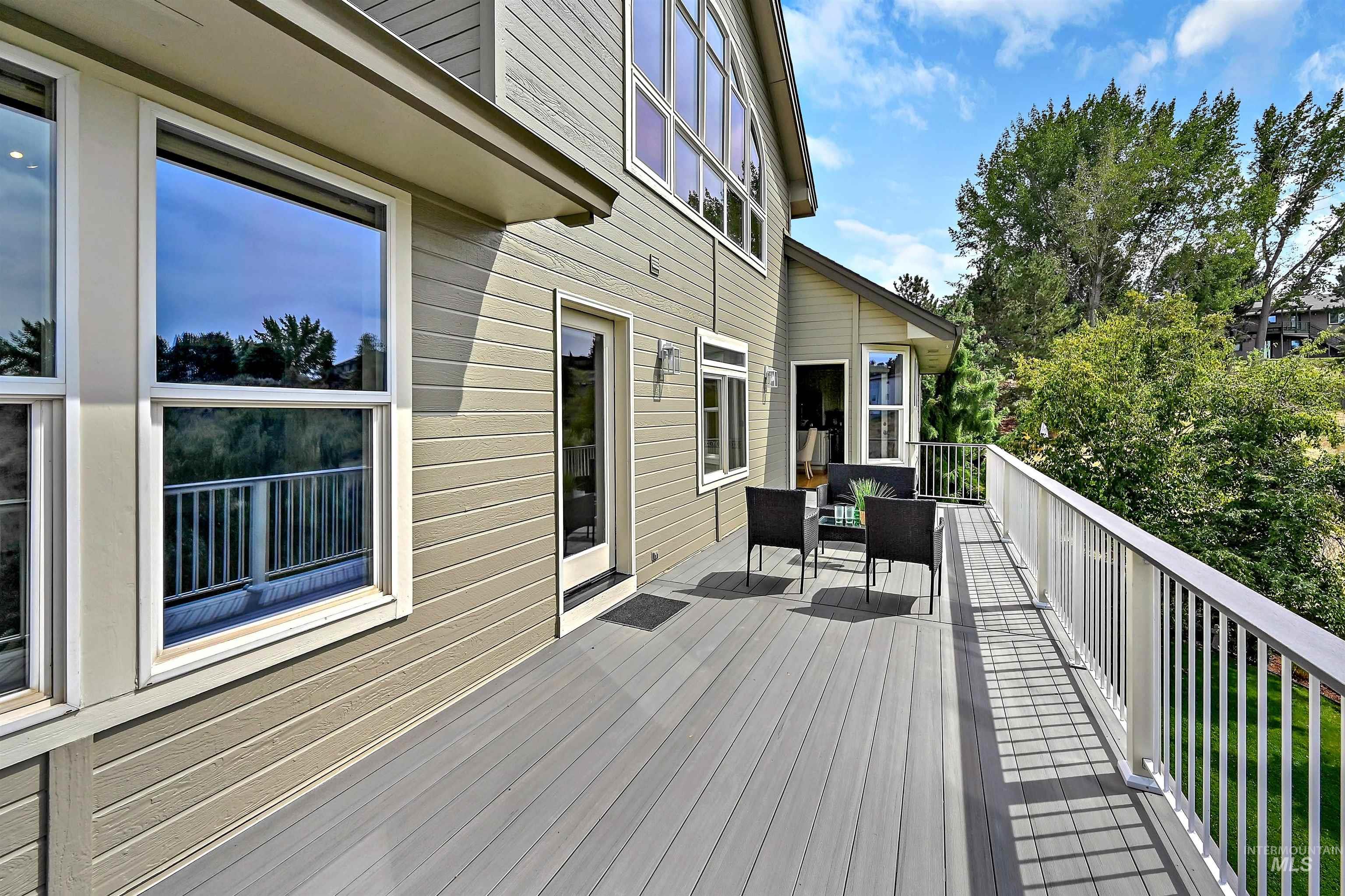 Wooden deck with an outdoor hangout area