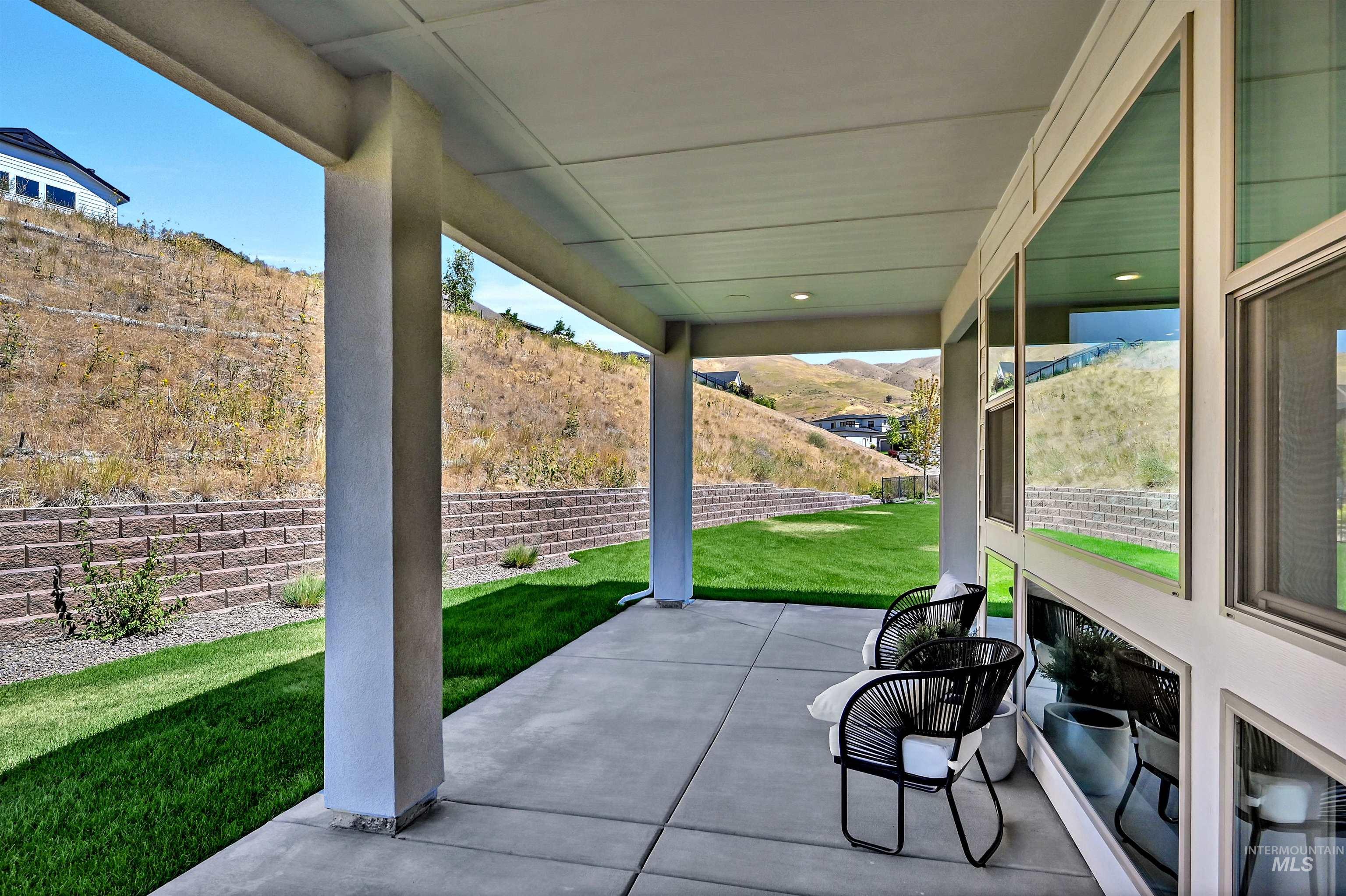 View of patio with a mountain view
