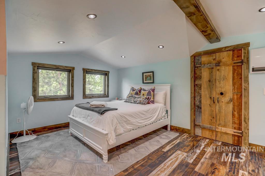Bedroom featuring wood-type flooring and recessed lighting