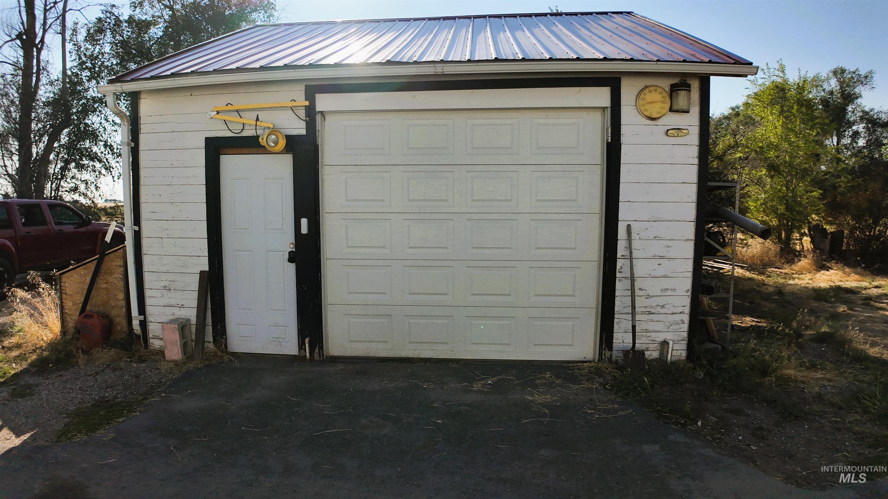 Garage featuring driveway
