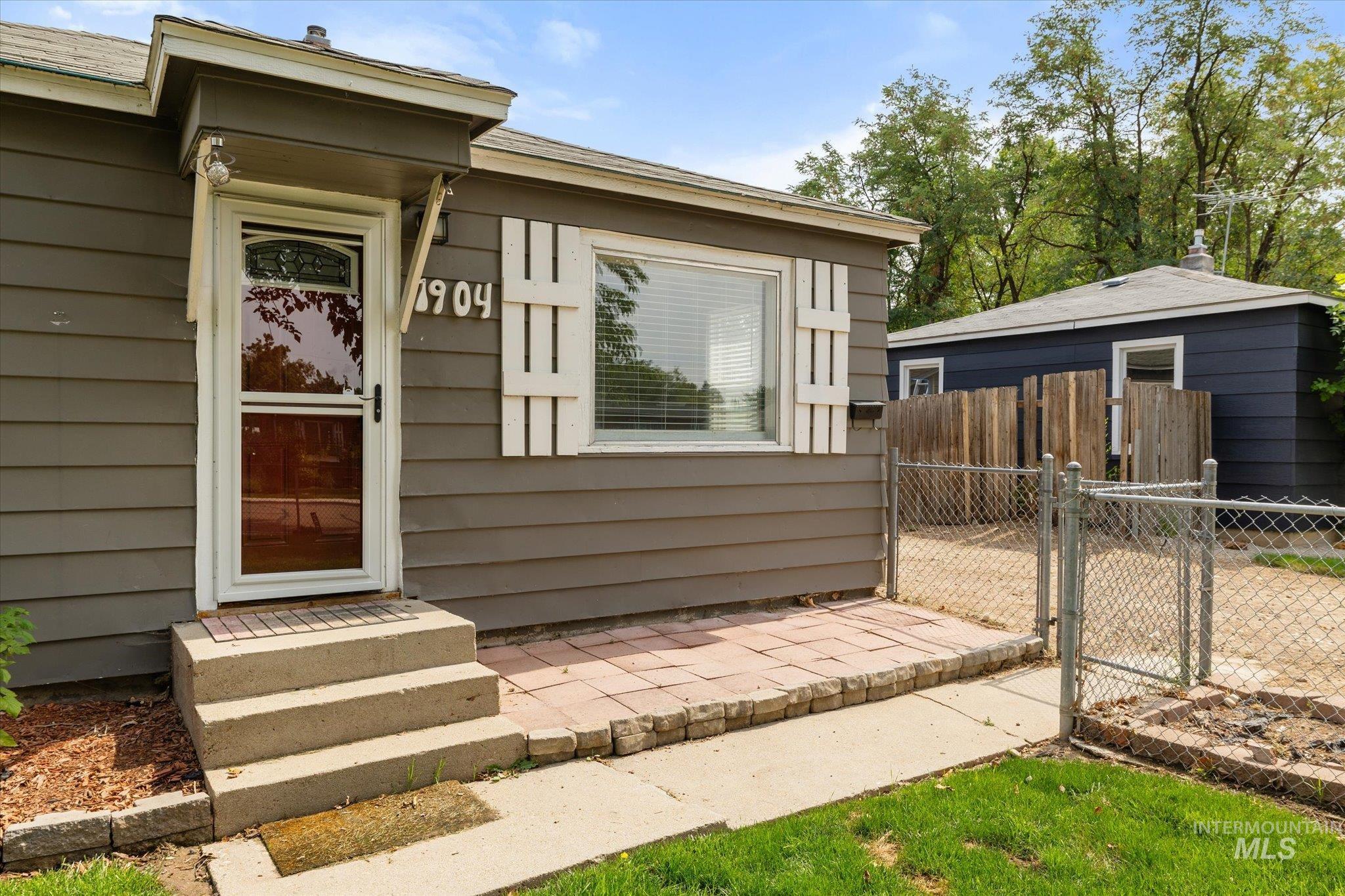 Property entrance featuring a gate