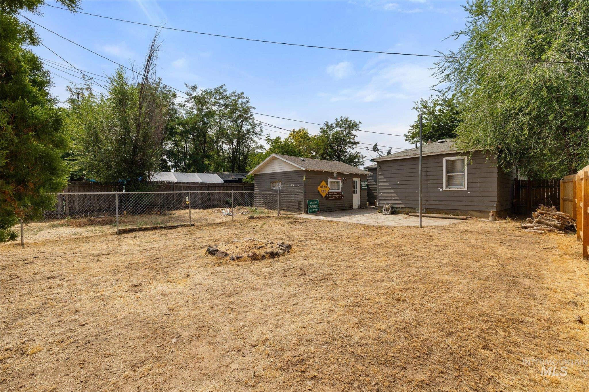 Fenced backyard featuring a patio area