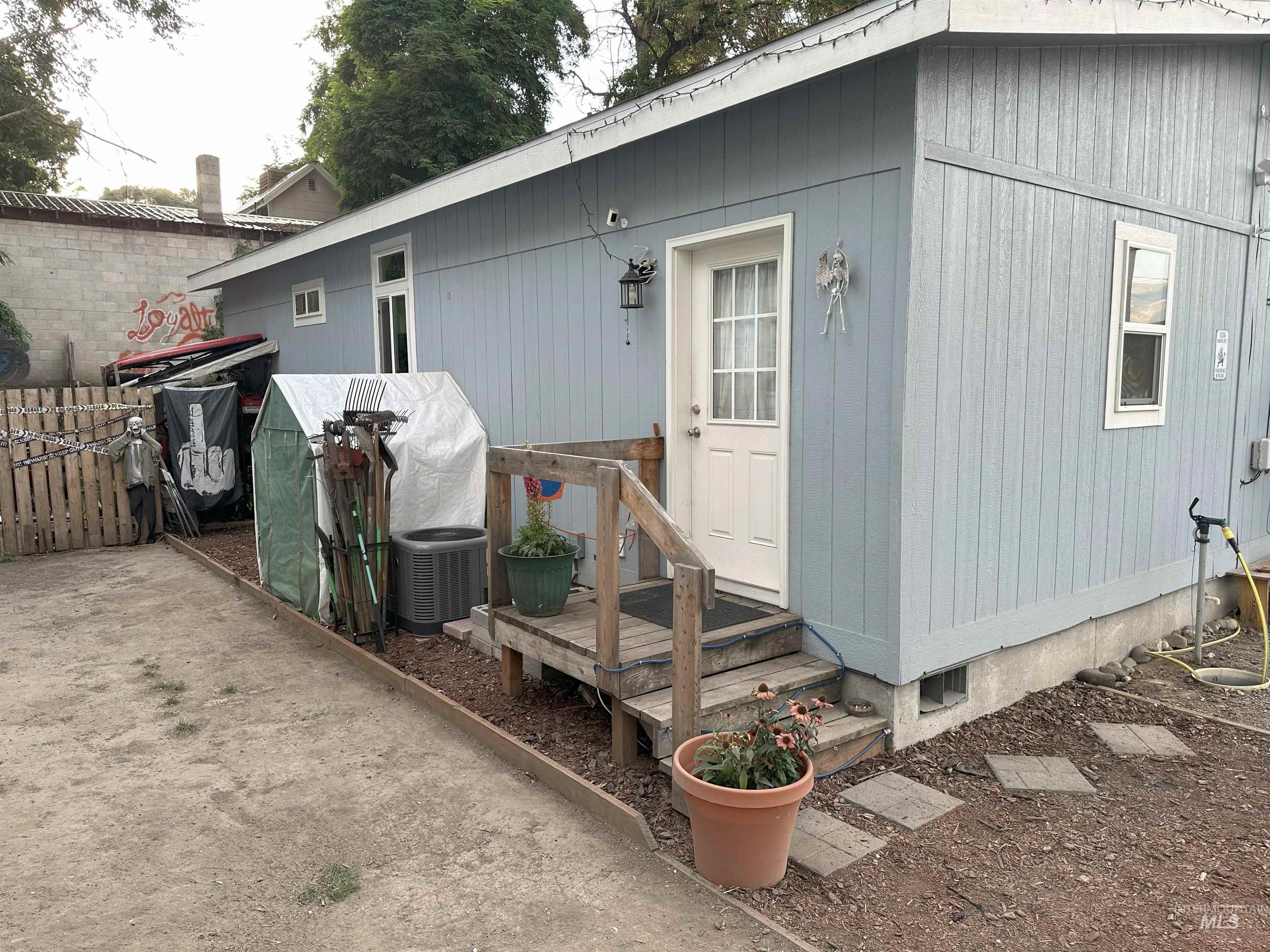 Entrance to property with a wooden deck