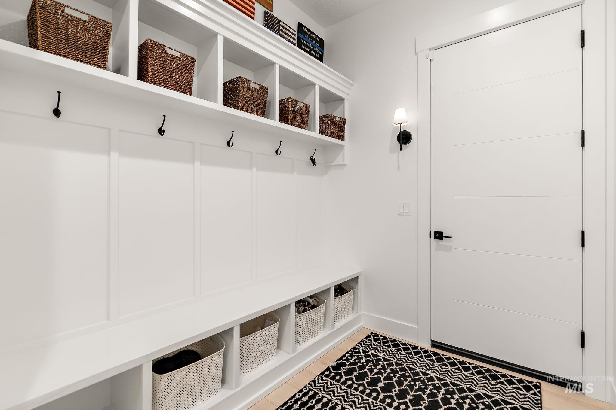 Mudroom featuring light tile patterned flooring