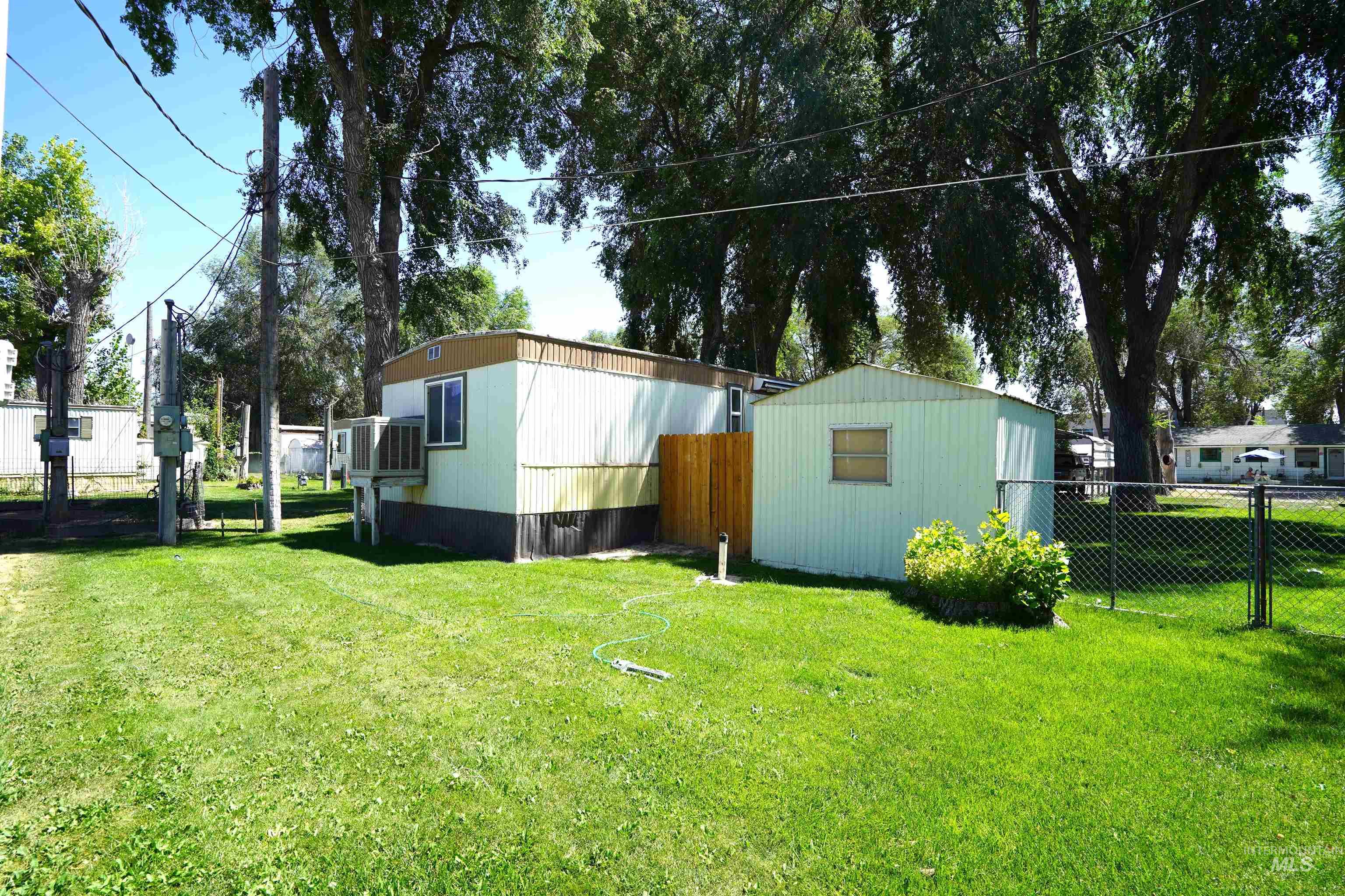 View of yard with an outdoor structure