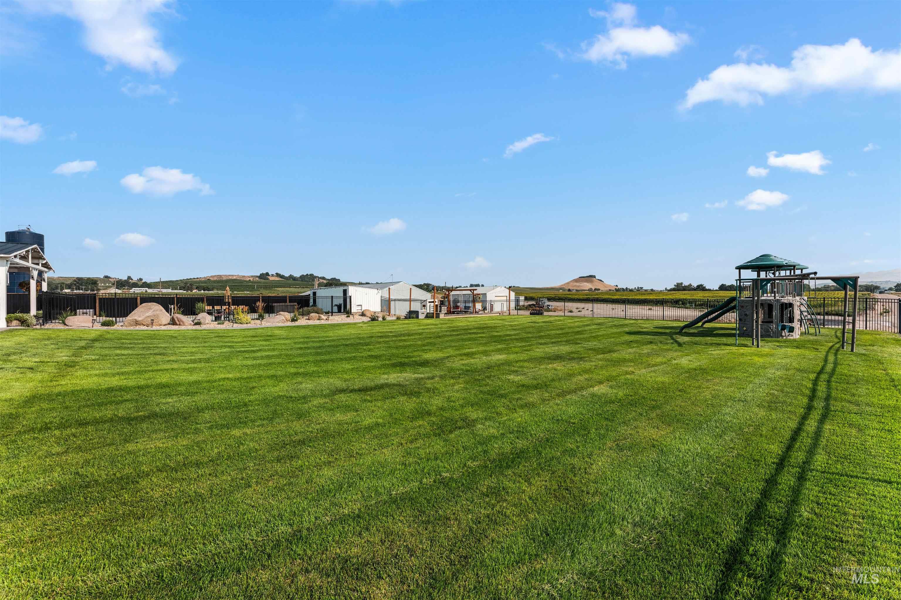View of yard with a playground