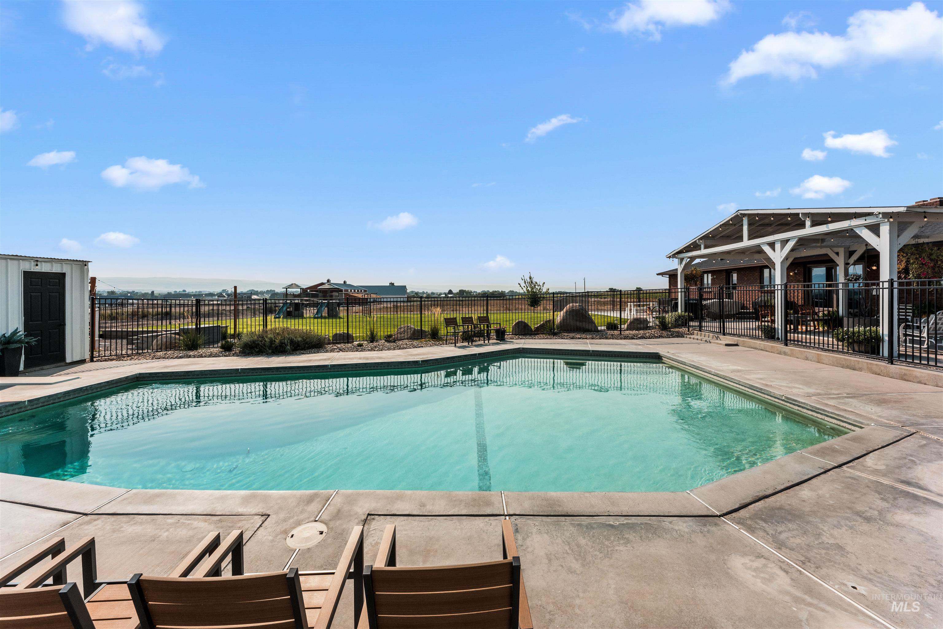 View of swimming pool featuring a patio area