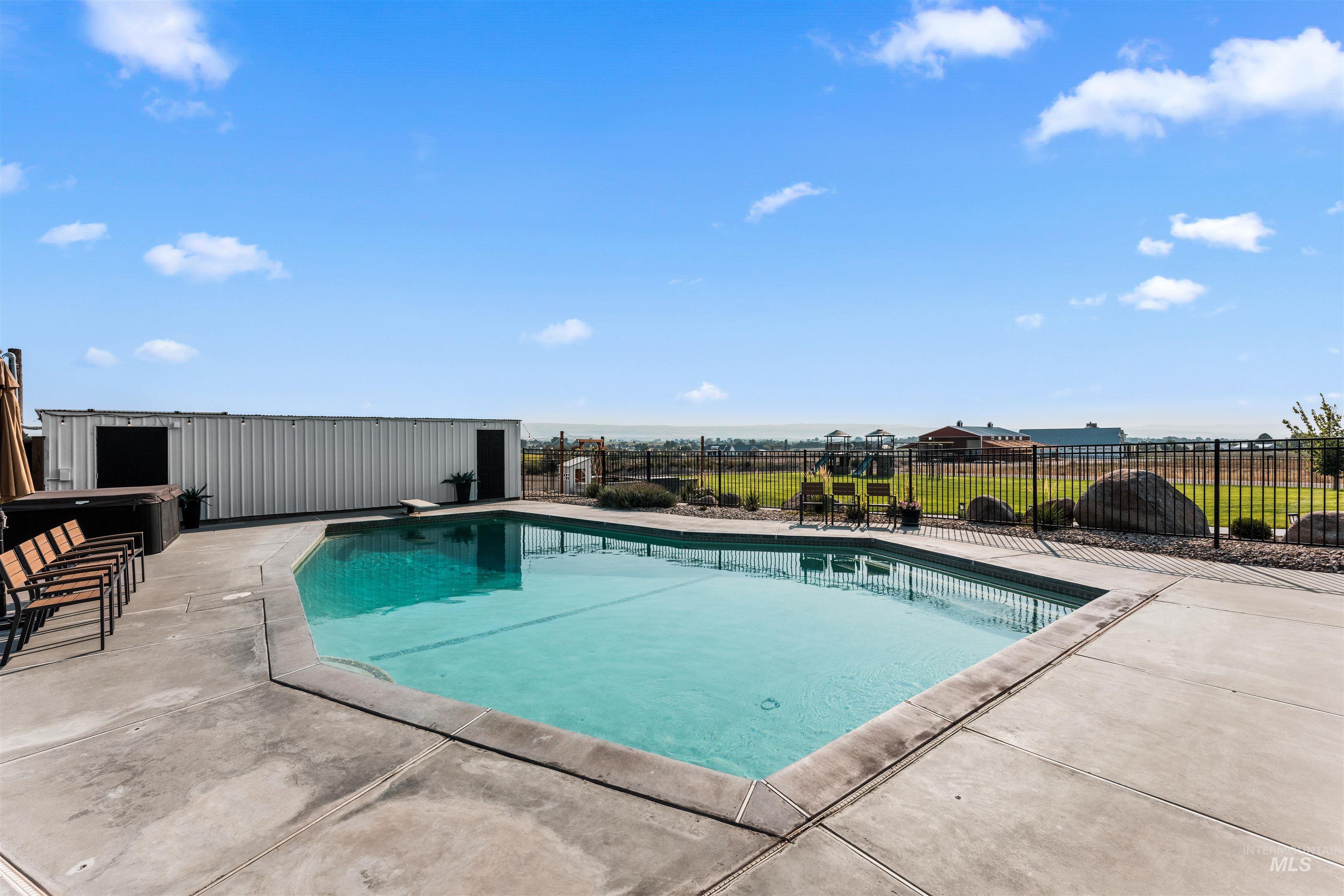 View of pool featuring a patio area