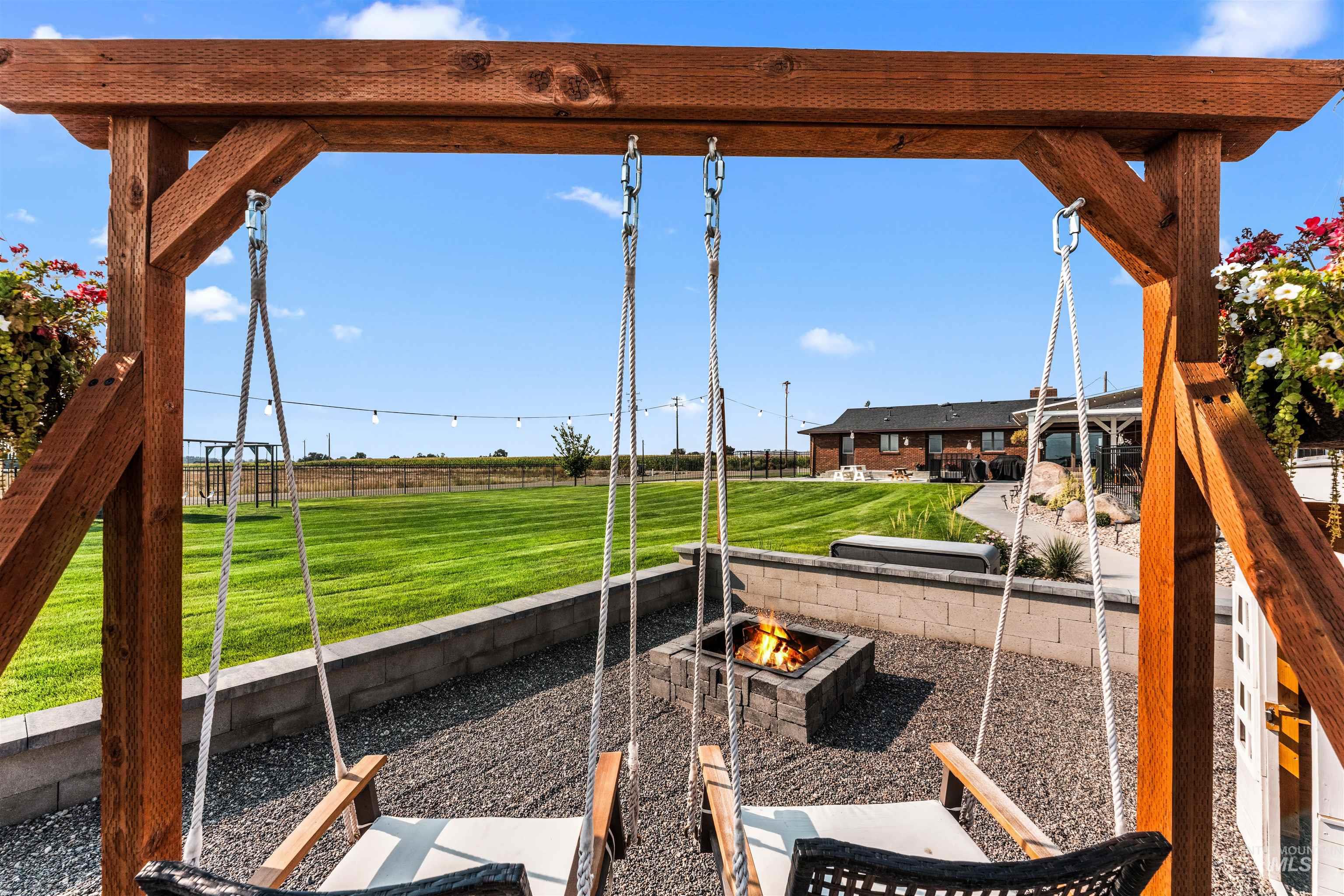 View of patio / terrace with an outdoor fire pit