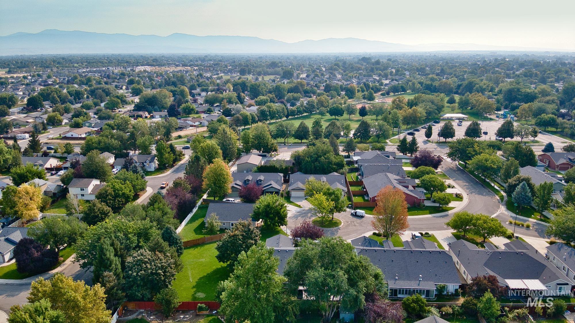 Aerial perspective of suburban area featuring mountains