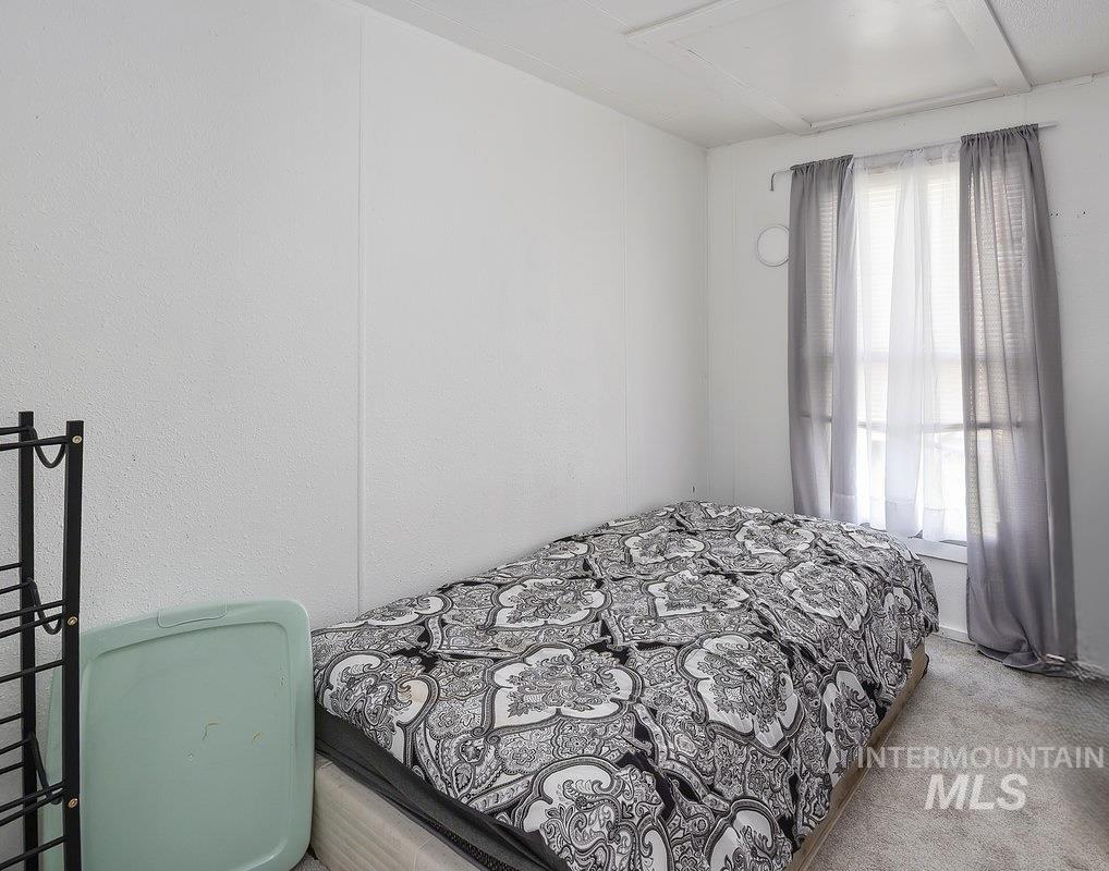 Bedroom with carpet