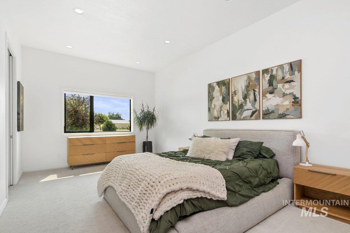 Bedroom with carpet flooring and recessed lighting