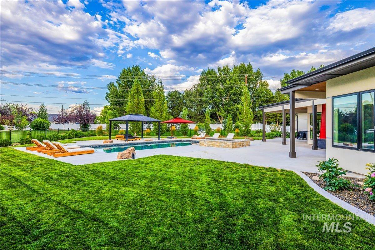 View of yard with a gazebo and a patio area