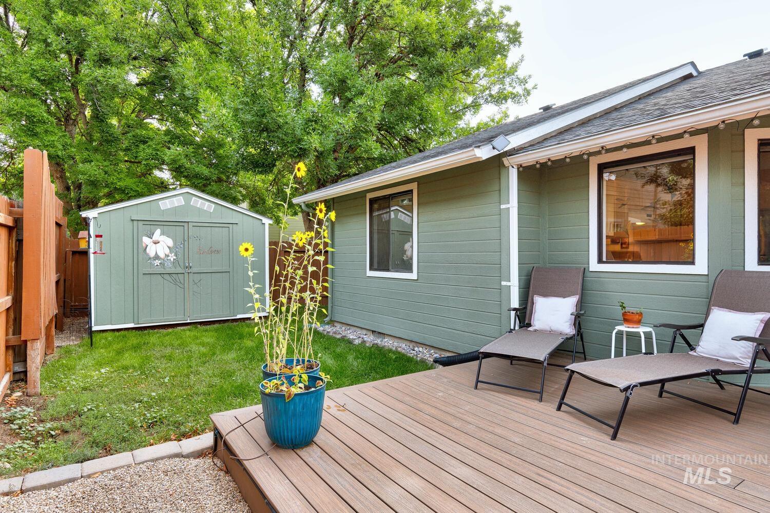Deck with a storage shed