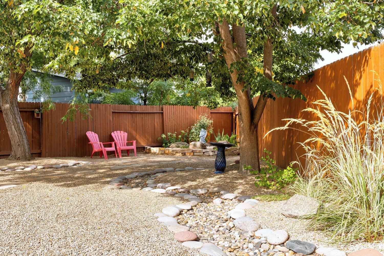 View of fenced backyard