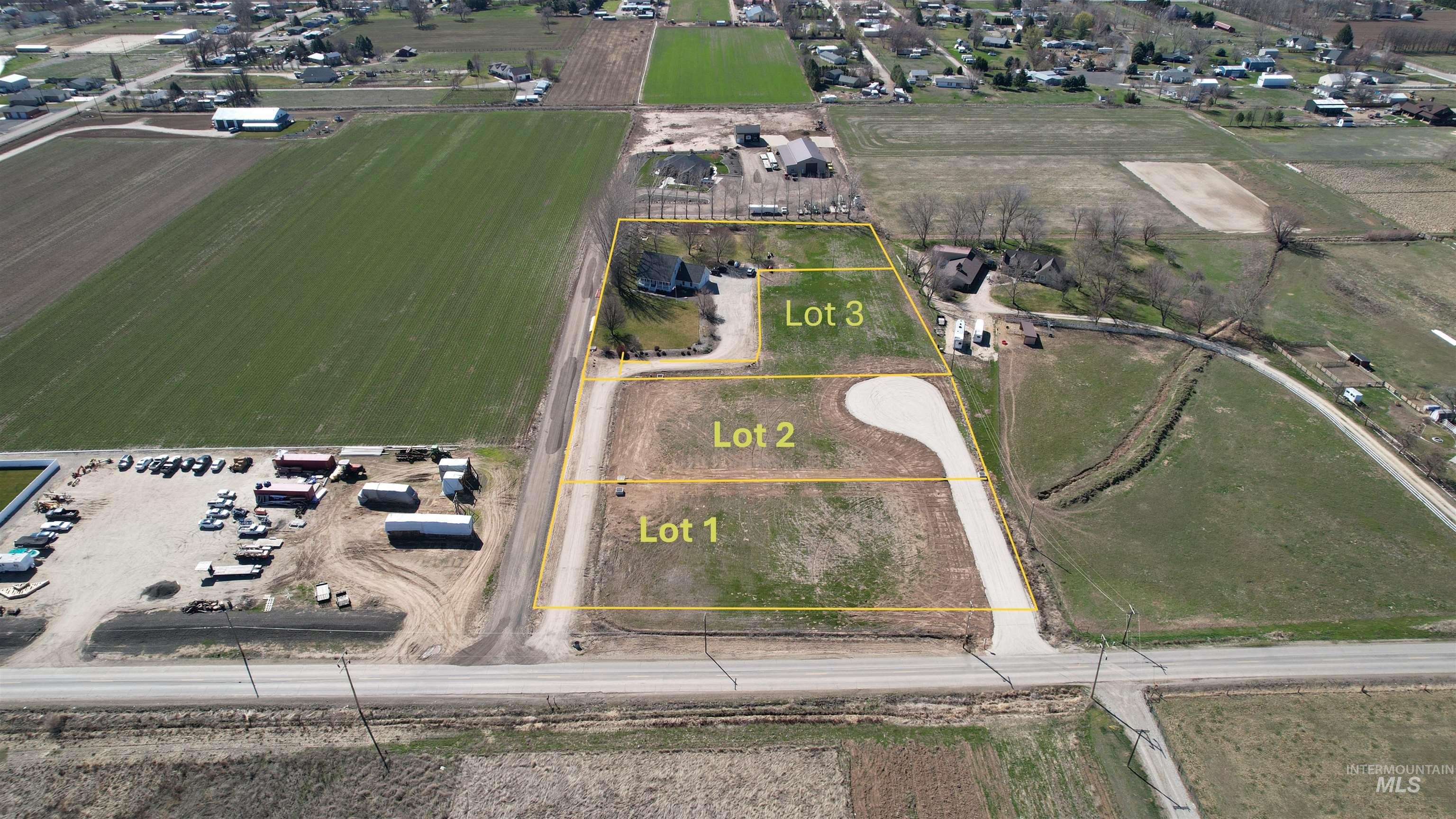 Aerial view of property and surrounding area with property boundaries highlighted