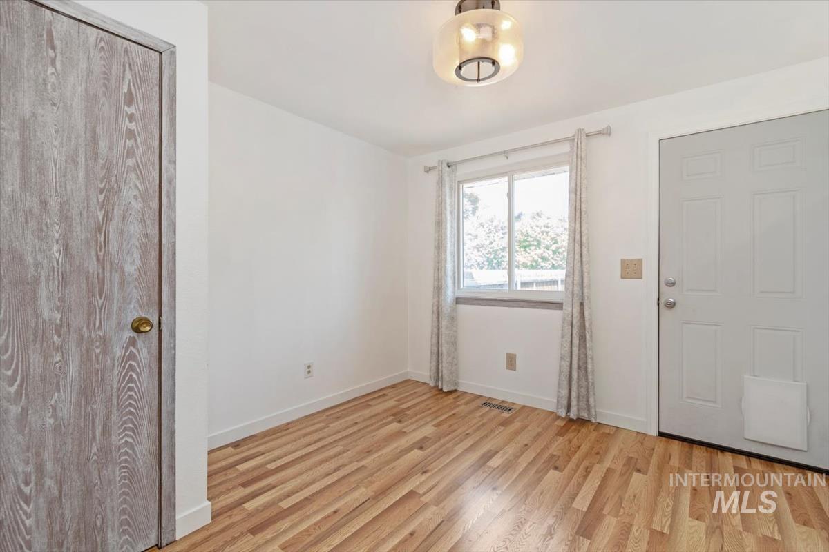 Entryway featuring light wood-type flooring