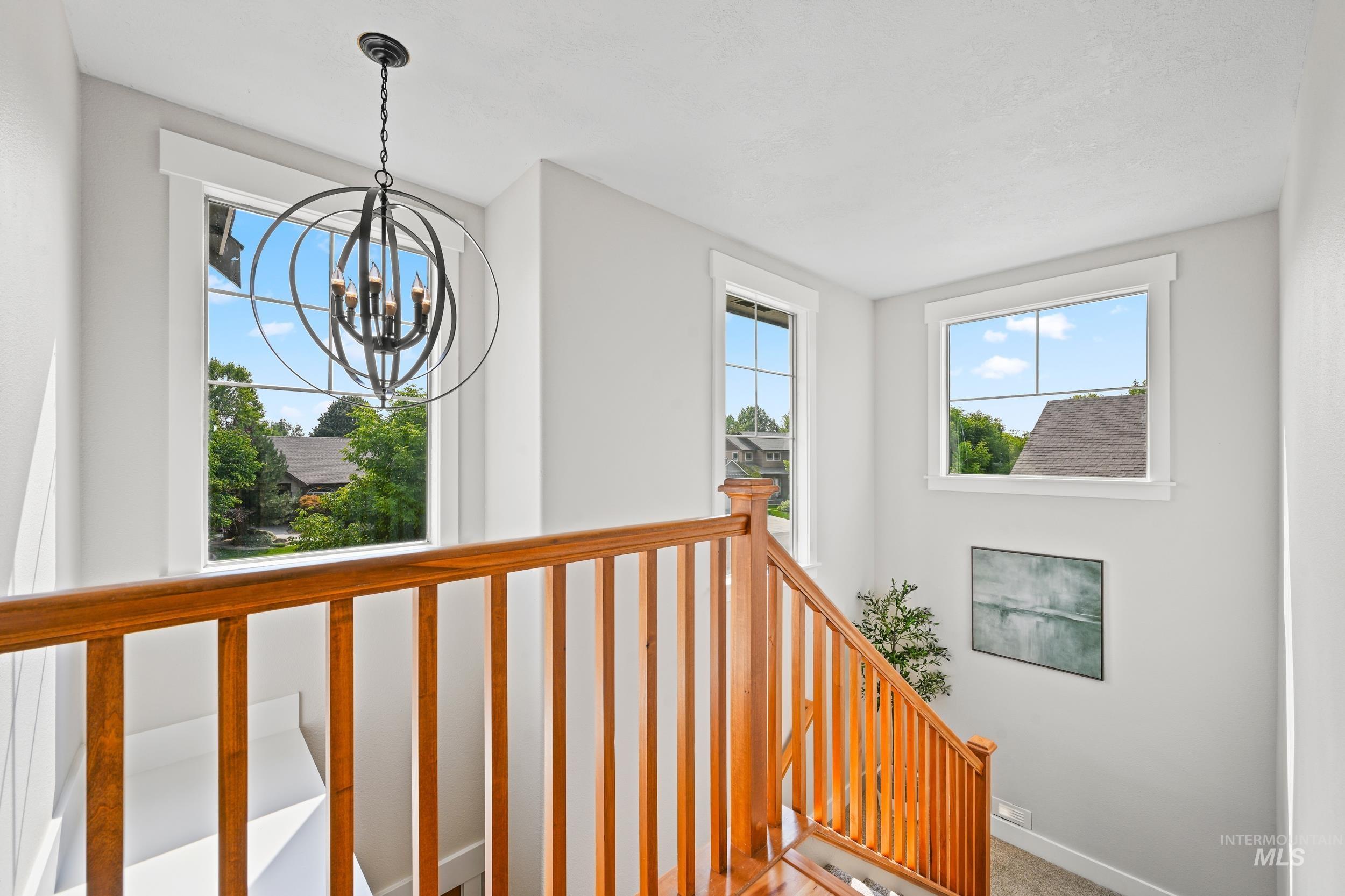 Stairs with a chandelier