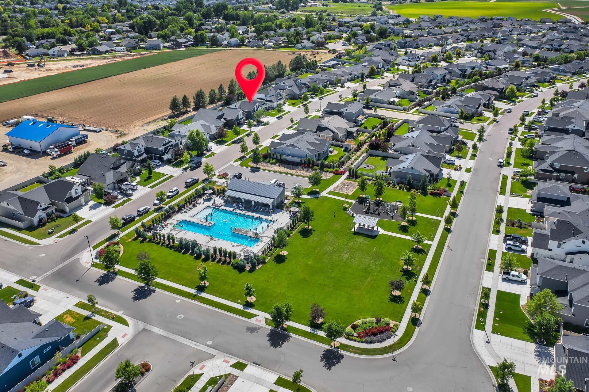 Aerial view of residential area with a pool area
