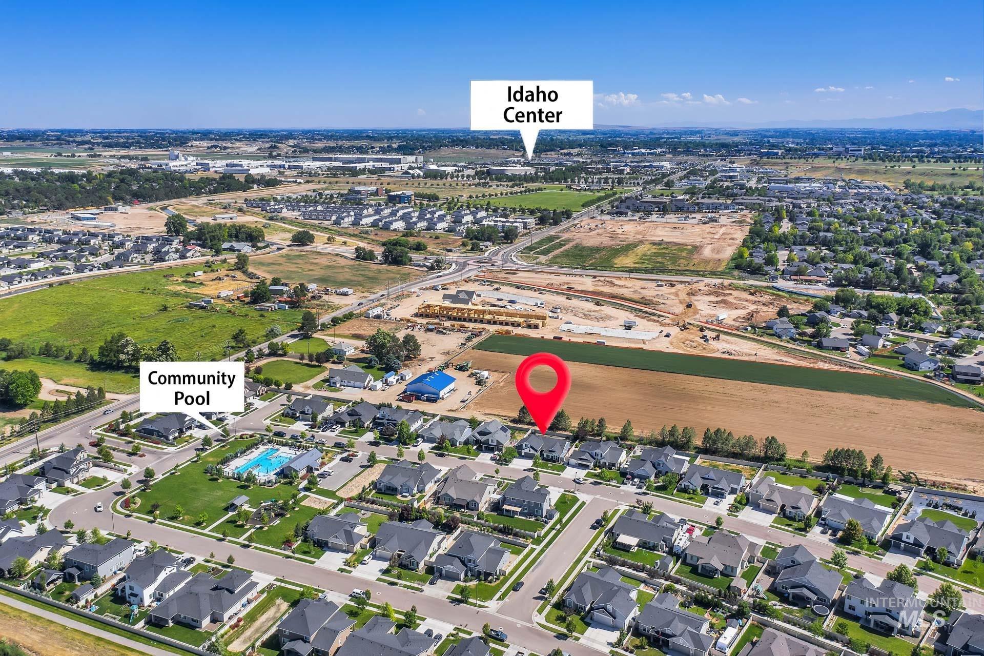 View of property location with nearby suburban area