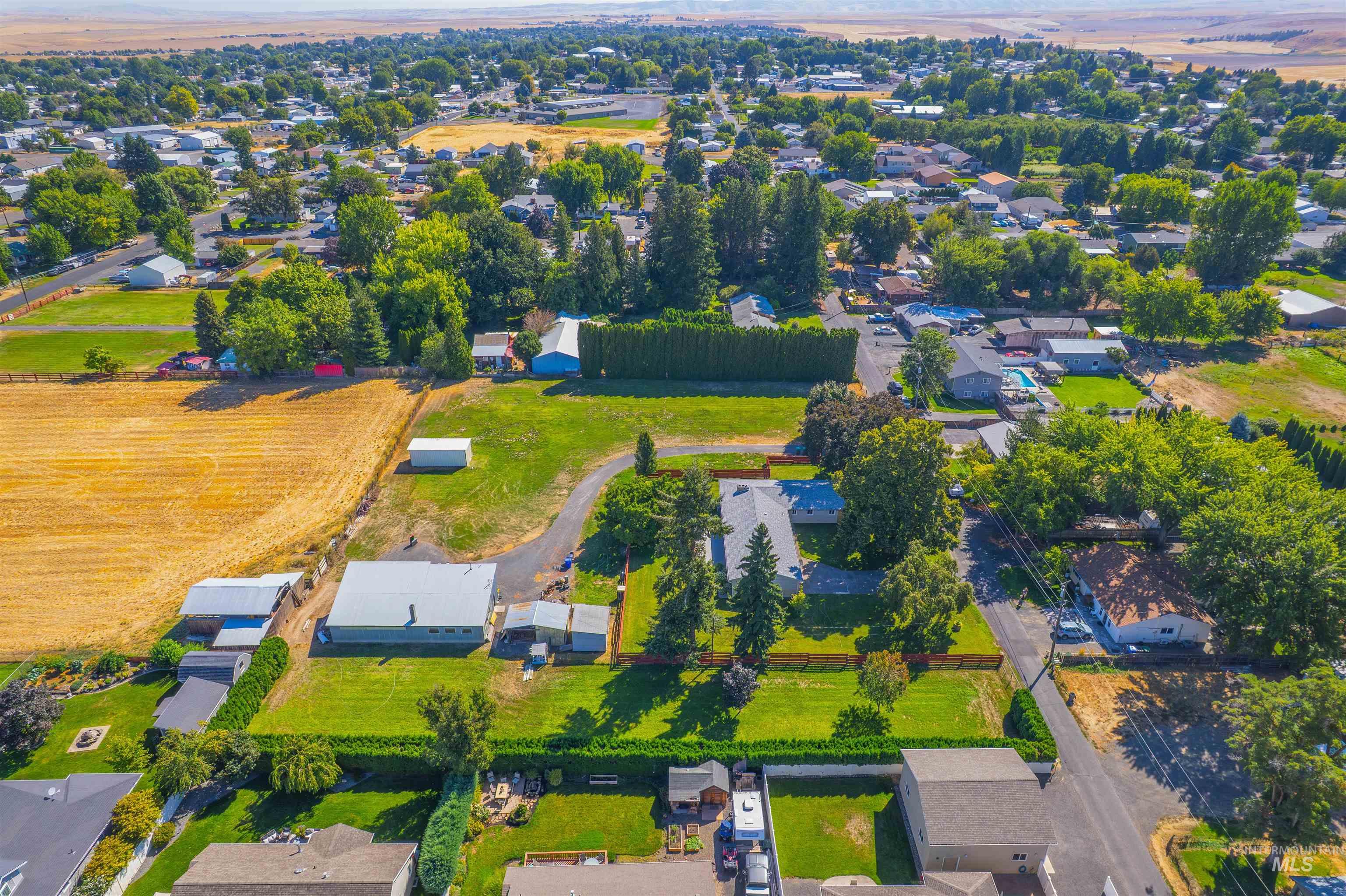 View of property location with nearby suburban area