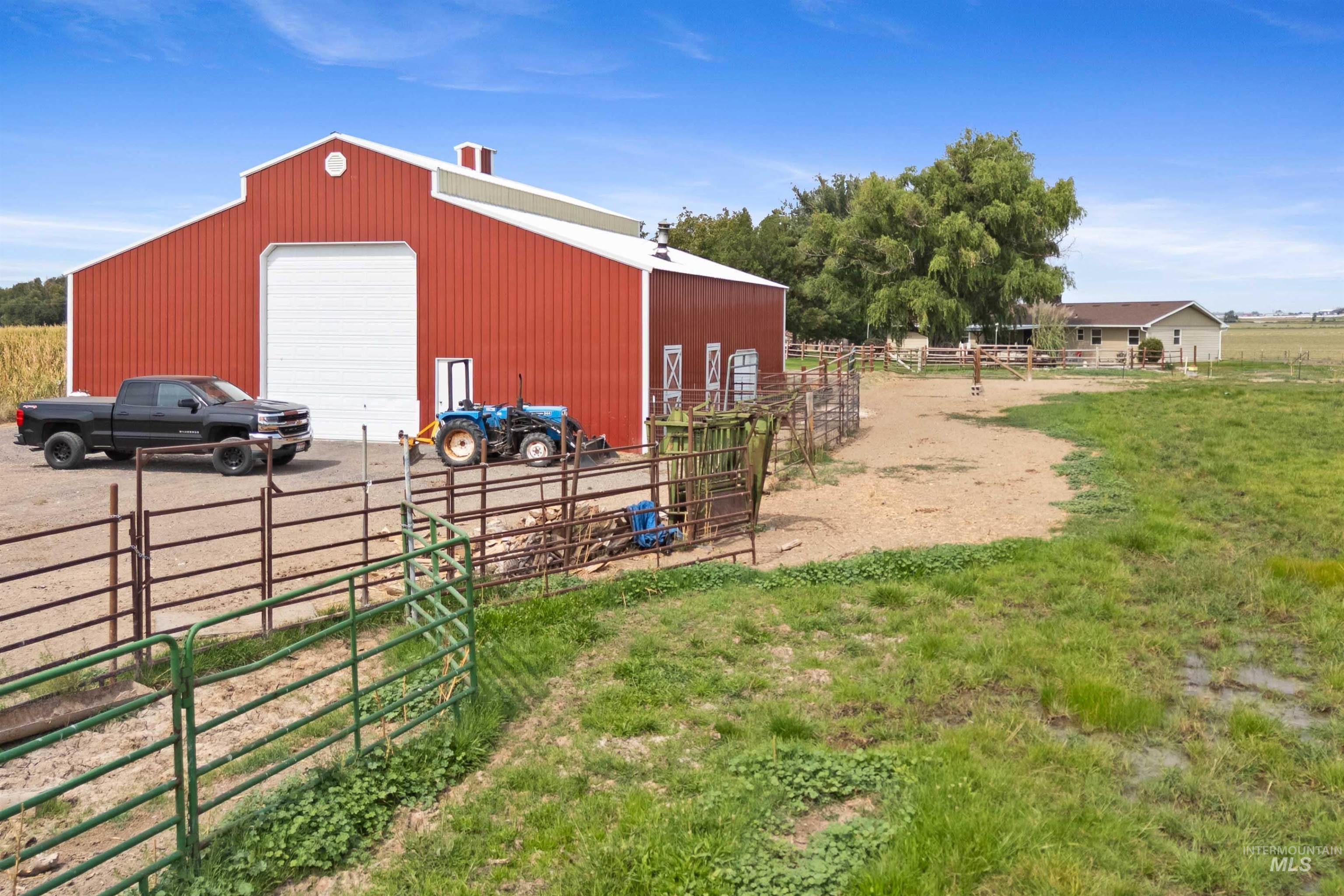 View of pole building featuring a rural view