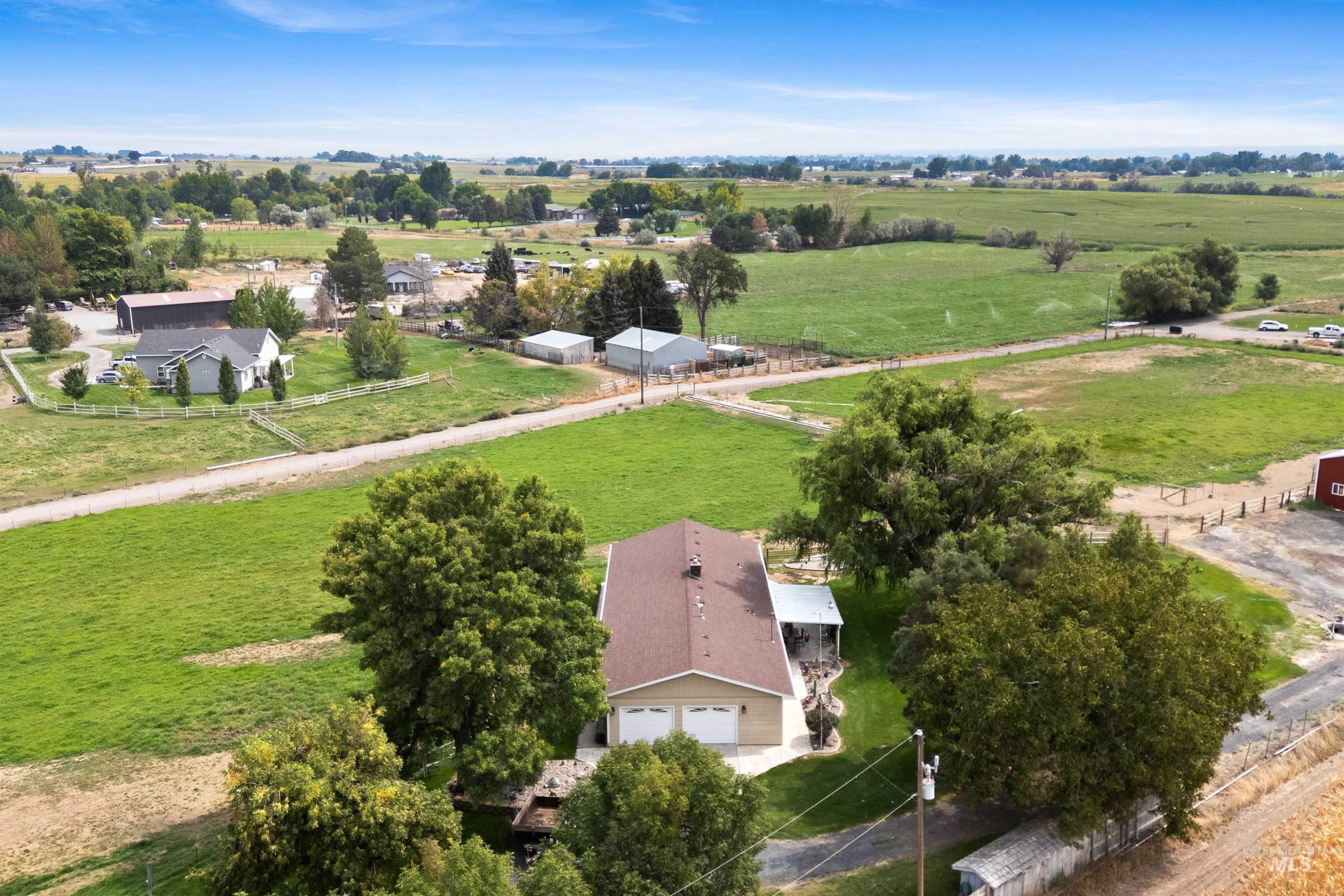 Overview of rural landscape featuring a pastoral area
